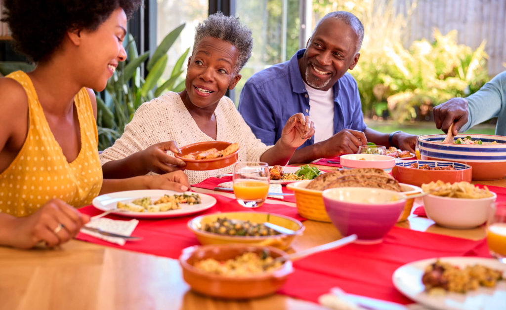 Tips for a Successful Conversation About Senior Living With Your Family Three family members eating at the table