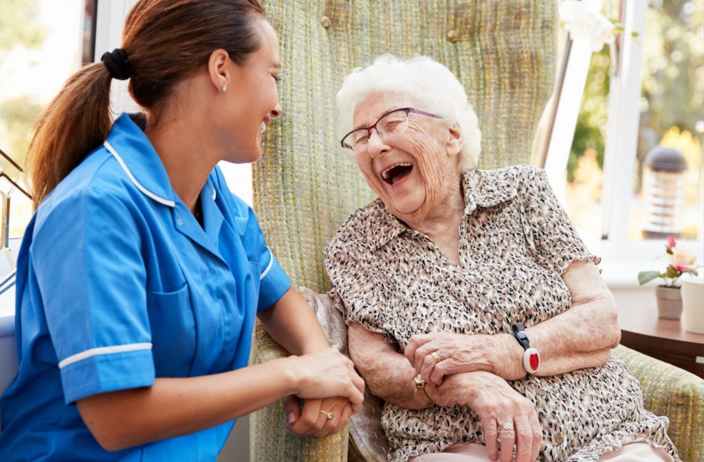 A memory care staff connecting with one of the residents.