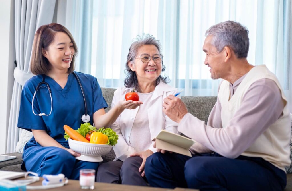 A senior couple gets advice from a nutritionist to build a better diet to support gut health as they age